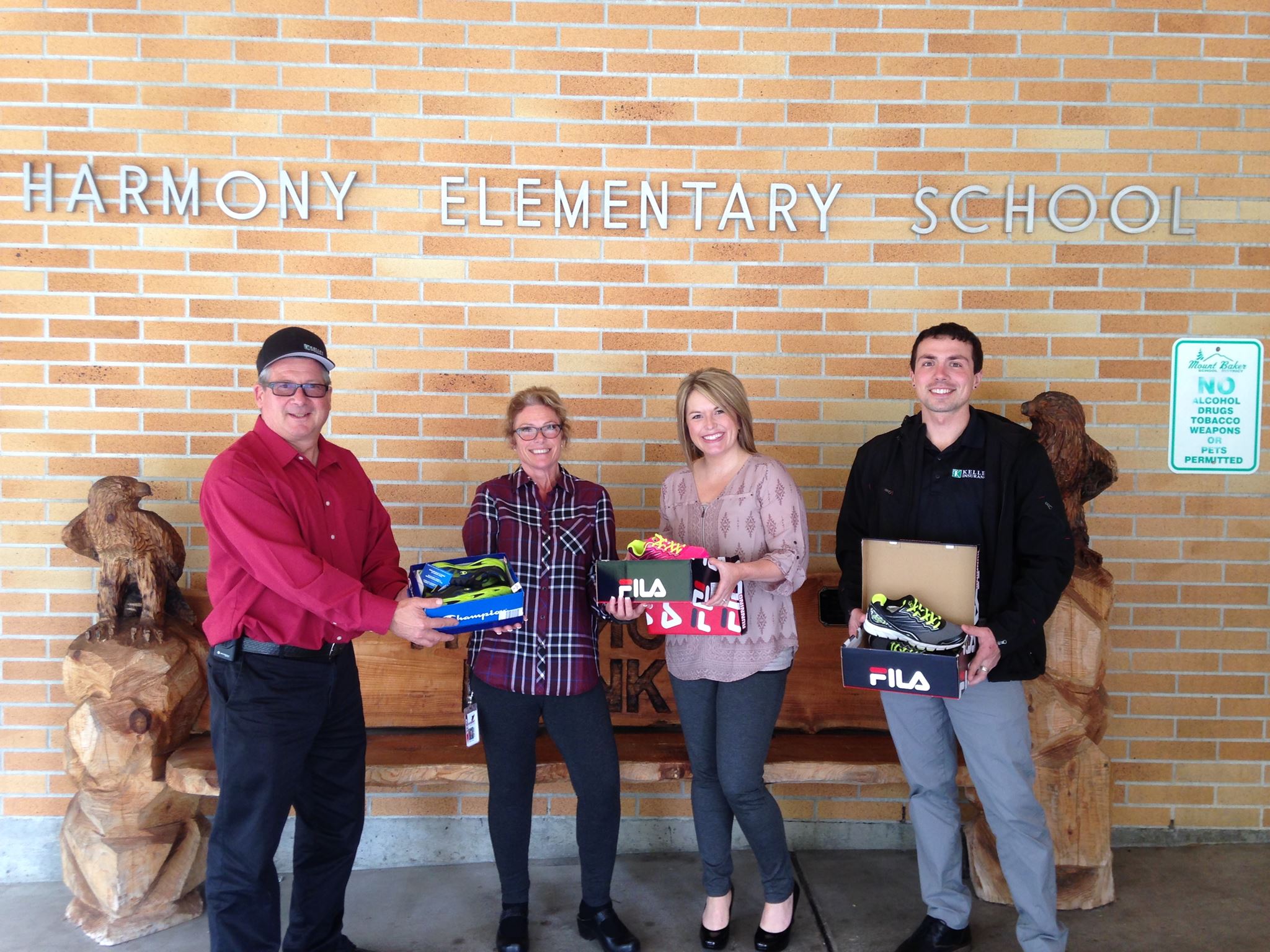 Donating Shoes to Children at Harmony Elementary